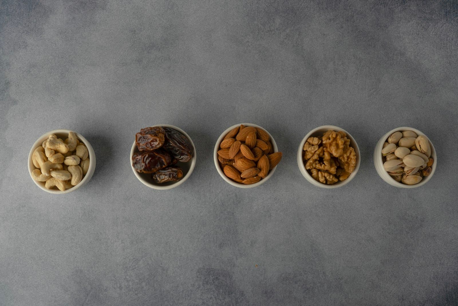Assorted premium dry fruits and nuts in bowls